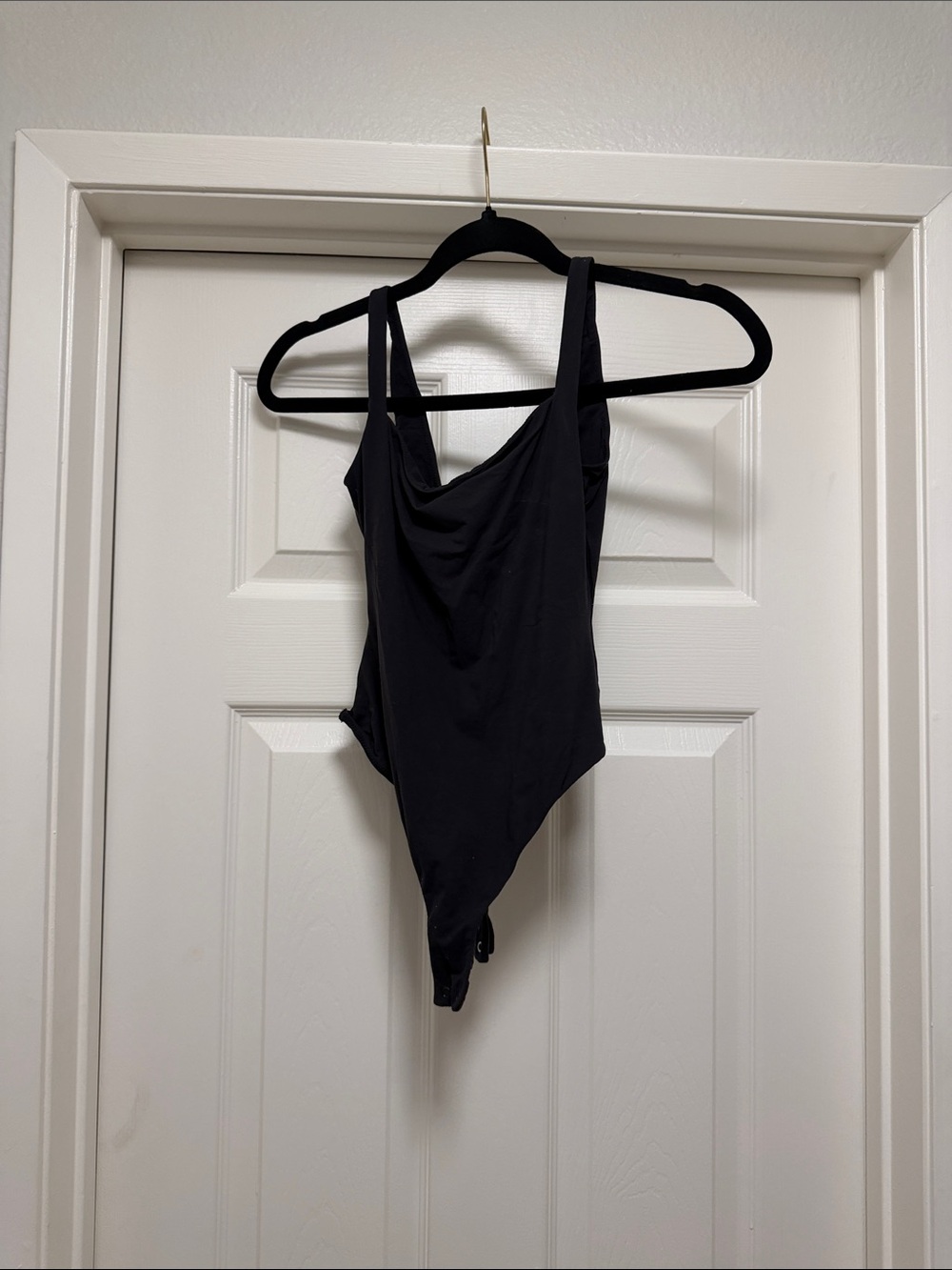 Skims Black One-Piece Bodysuit